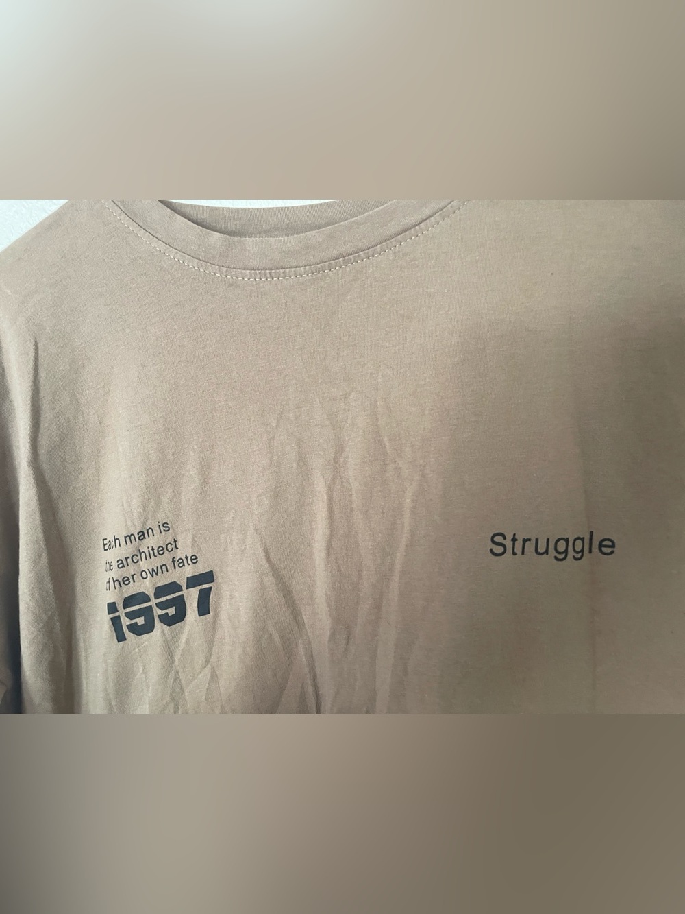 Each Man is the Architect of Her Own Fate tan long sleeve cotton shirt